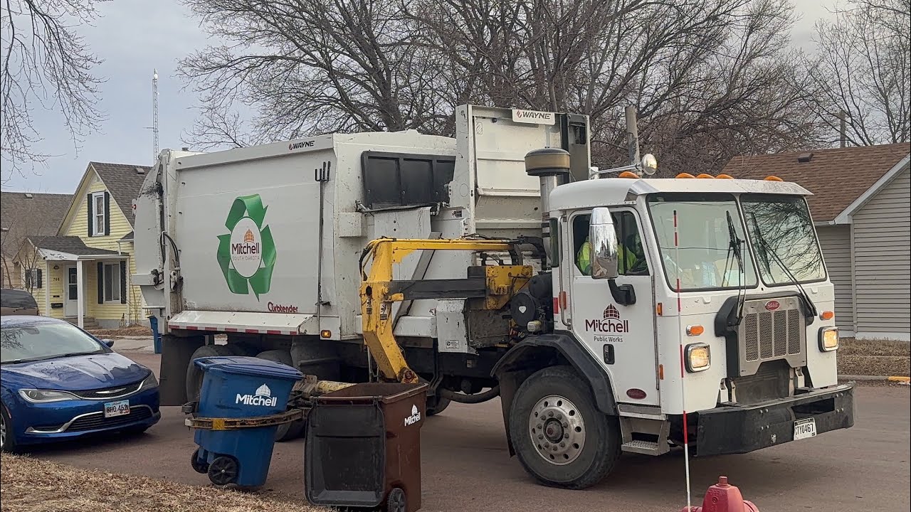 City of Mitchell Peterbilt + Freightliner Wayne Curbtender side loader garbage trucks 