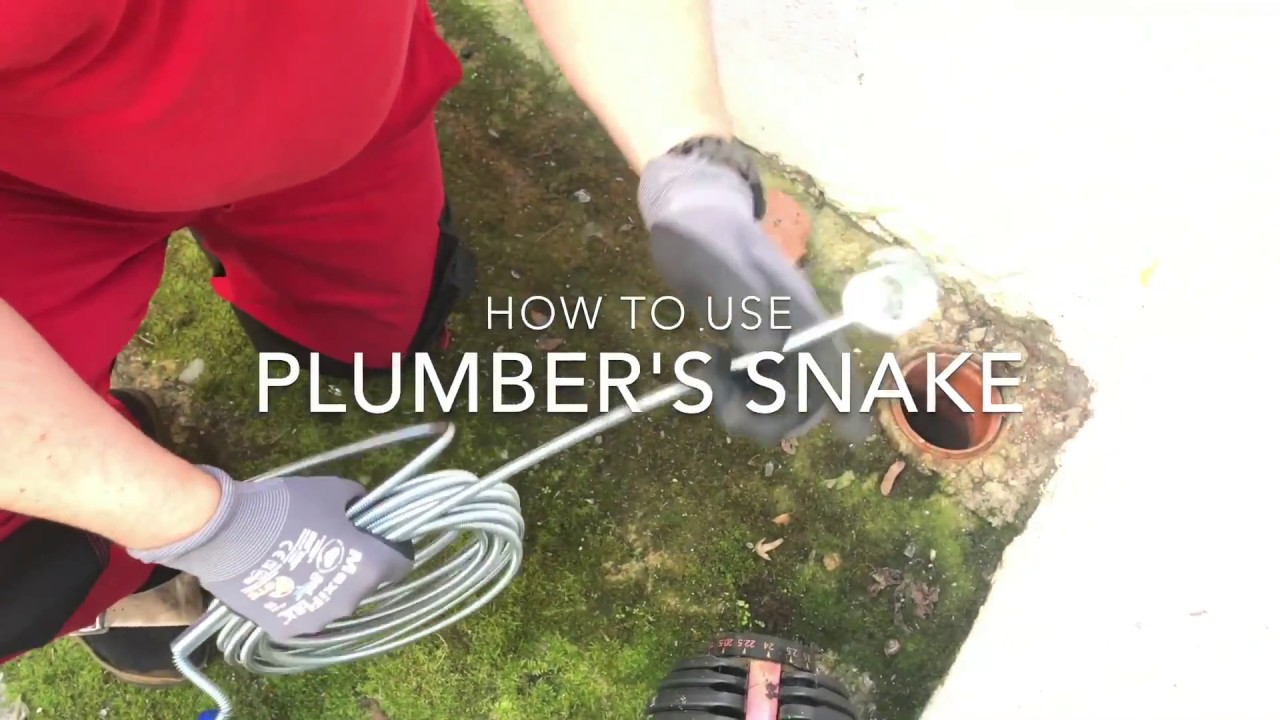 How to use a Plumbers snake to dislodge in plumping clean a drain with a toilet jack DIY