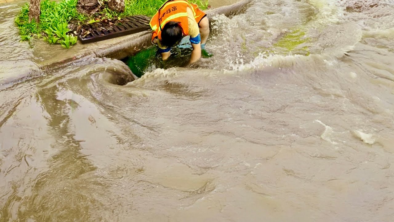 From Clogged to Flowing How to Unclog Flooded Street Drains!
