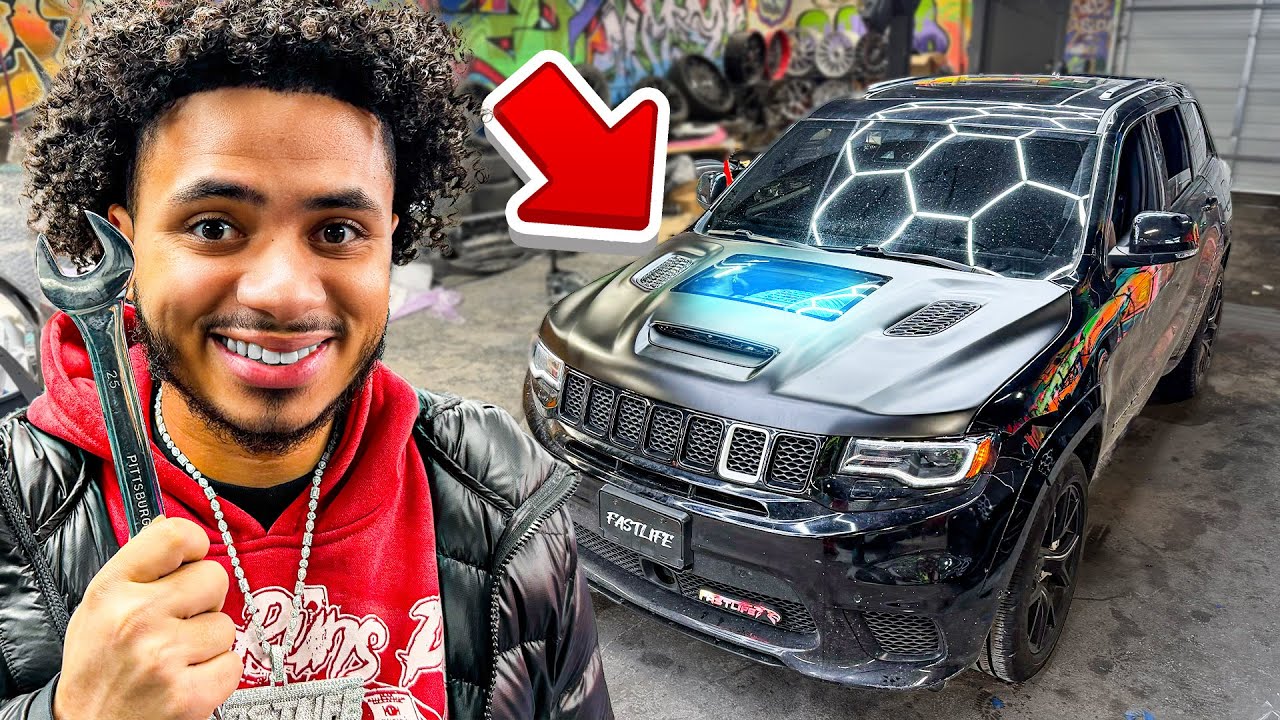 INSTALLING 1 OF 1 TRACKHAWK HOOD...
