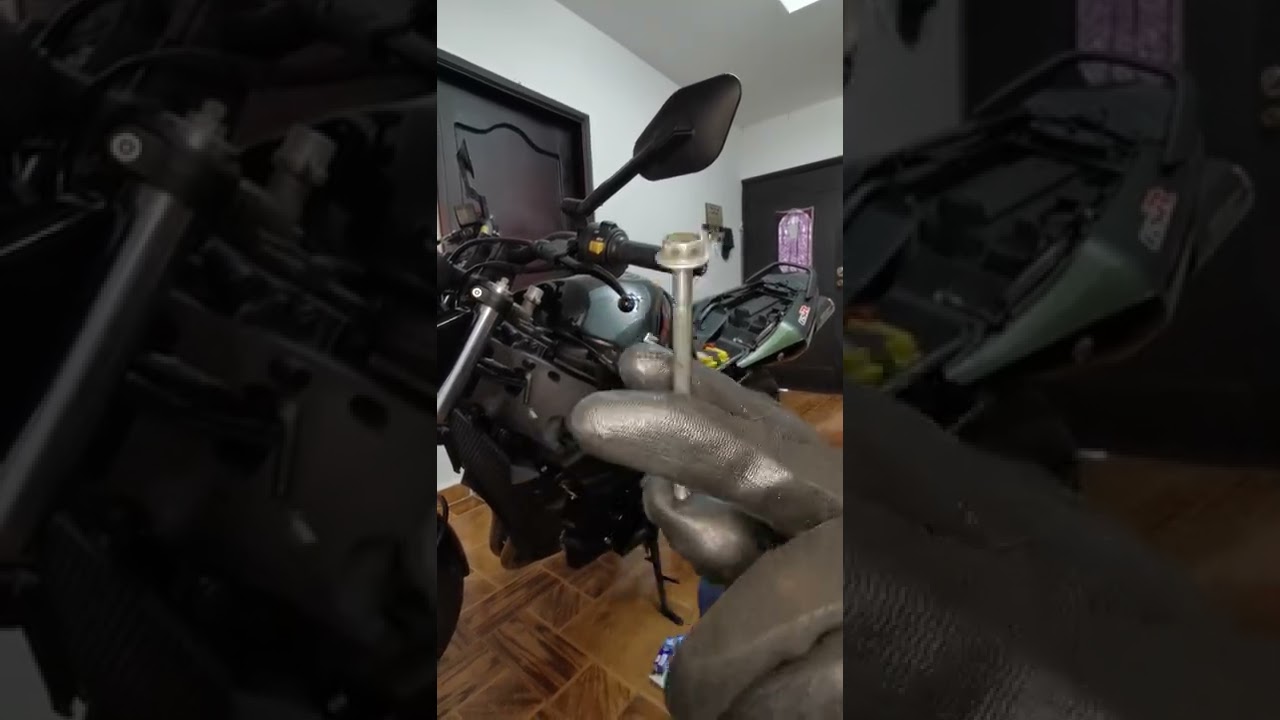 suzuki gsr 600, cambio de bujías.