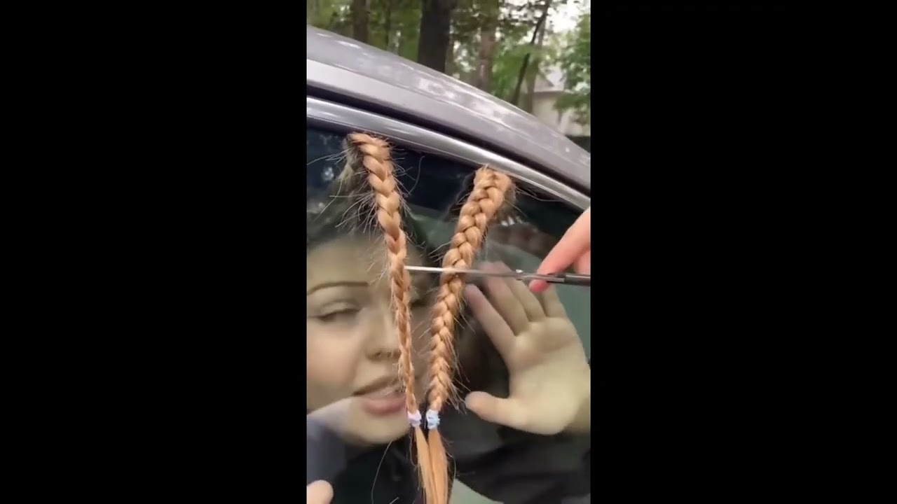Girl gets her hair stuck in car window and gets it cut off