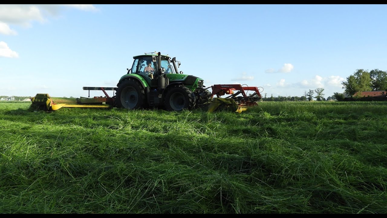 Gras maaien met Deutz Fahr Agrotron 6190 en Fella triplemaaier