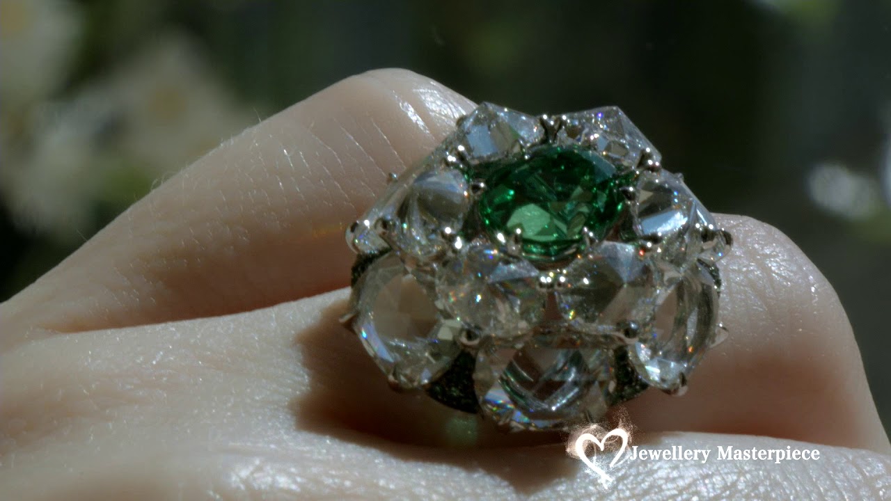 Nirav Modi High Jewellery diamond ring set with vivid green Kornerupine
