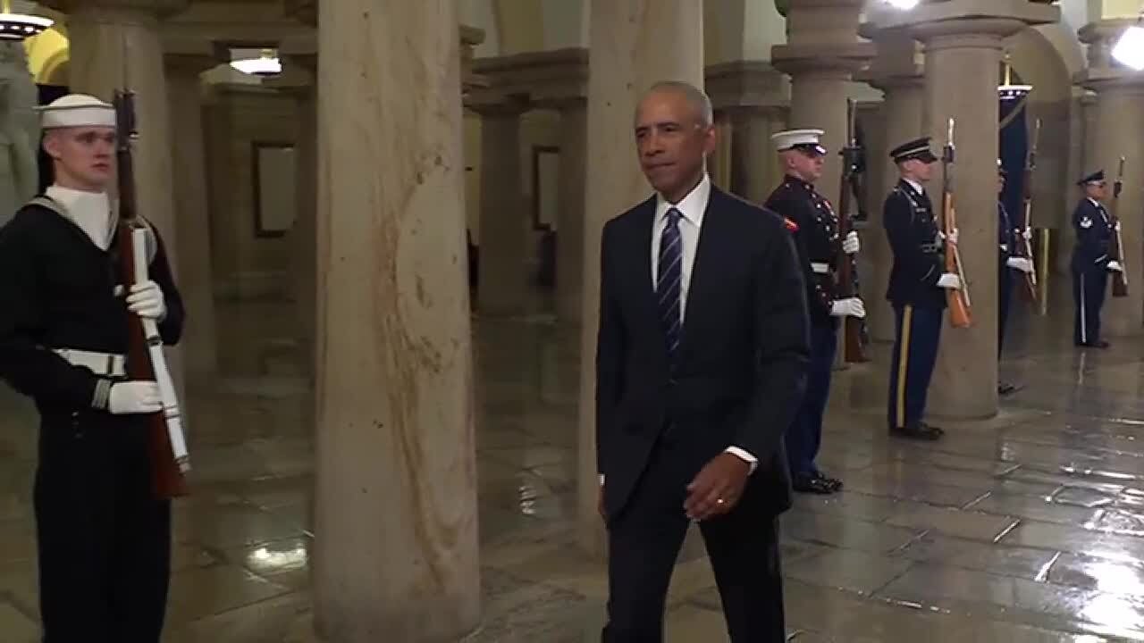 Former President Barack Obama arrives for Donald Trump's inauguration