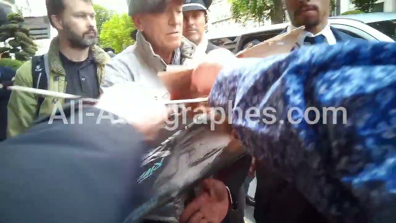 Bruce Springsteen signing autographs in Paris