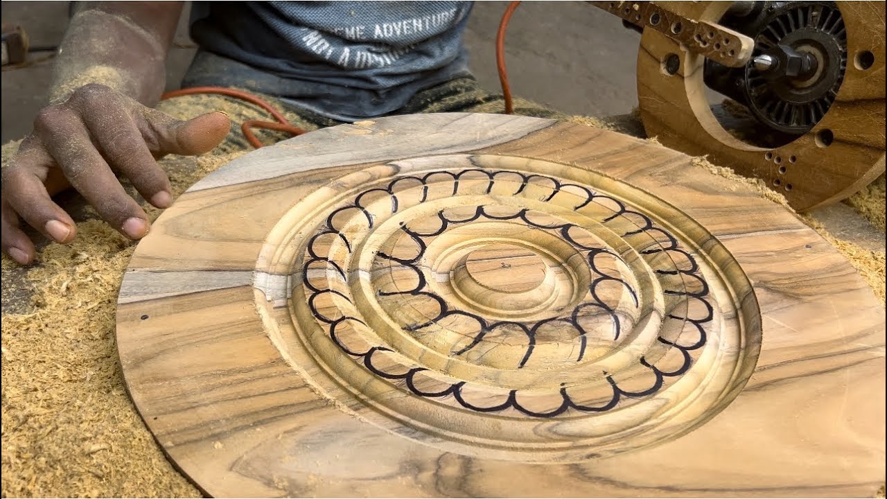 Carving with different router bits to make satisfying wood designs.