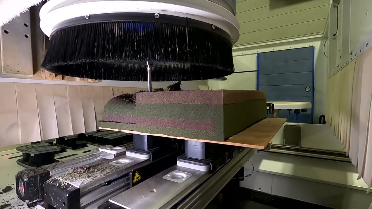 Homag Centateq P-115 5 Axis cutting a seat cushion out of 5