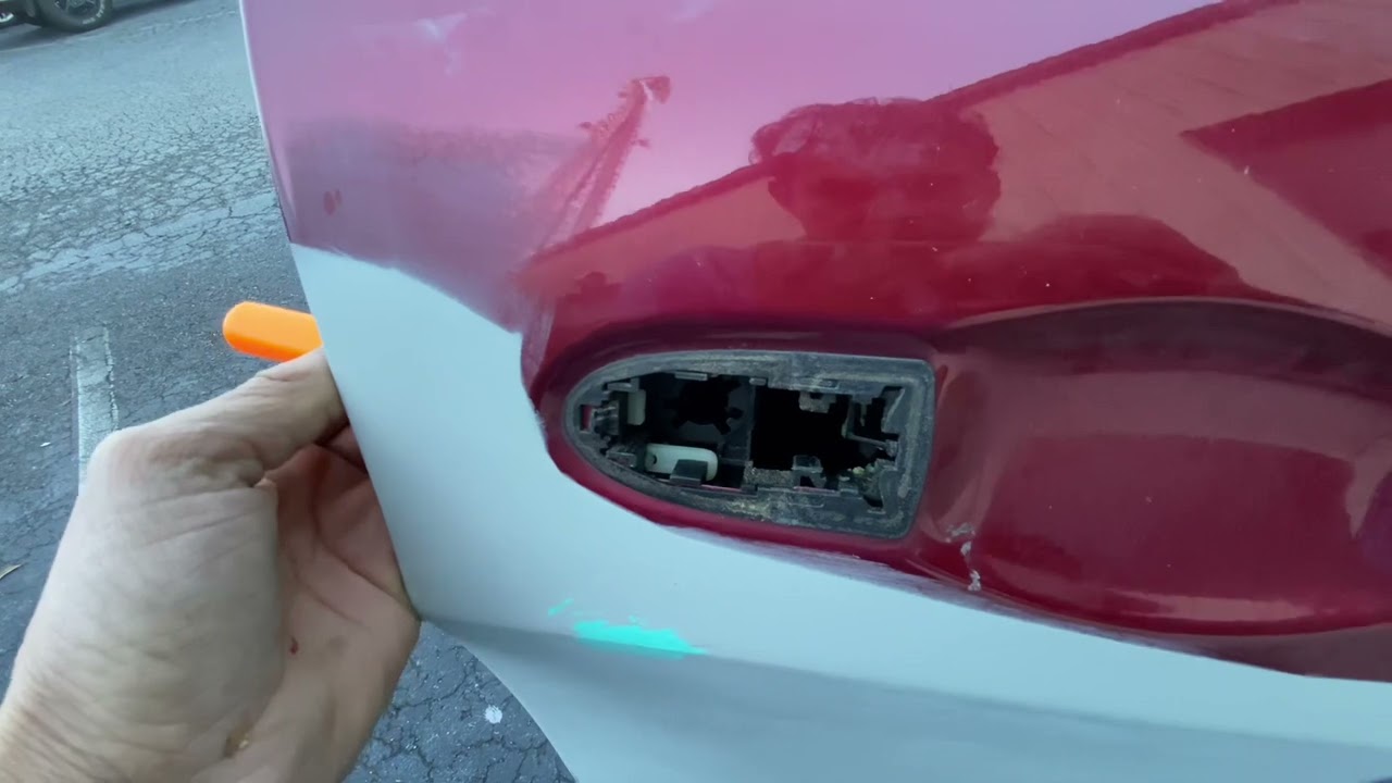 Como quitar y poner manija de 2014 jeep Cherokee