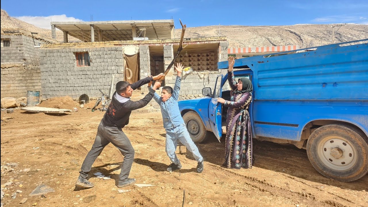 Hossein, the little son of nomads and his mother Soraya in the shadow of his older brother Hojjat