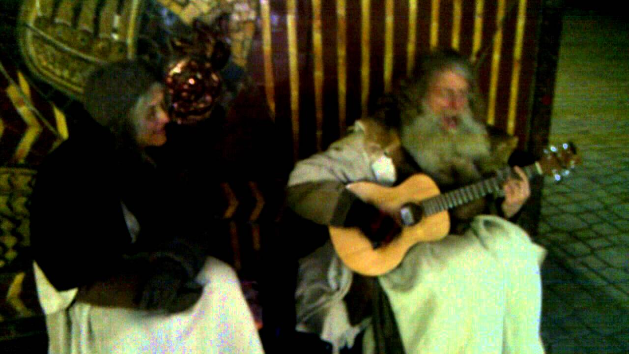 Old hipster singing in Kiev