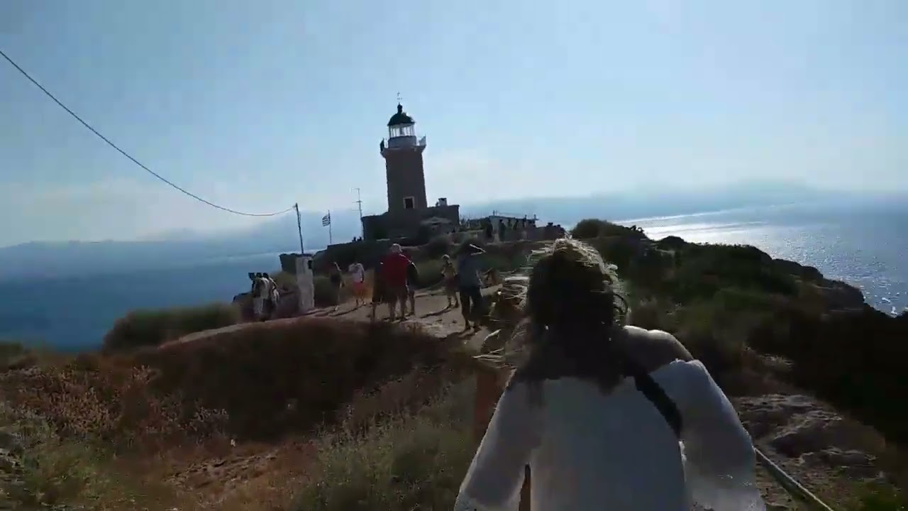 The historic Melagavi Lighthouse overlooking the Corinthian Gulf, Greece. June 2019.