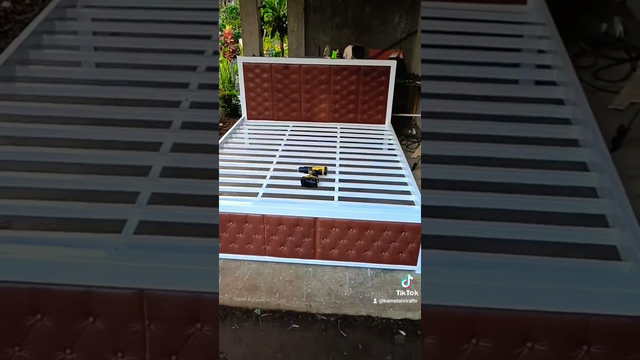 Bed frame with 3D foam tile self-adhesive