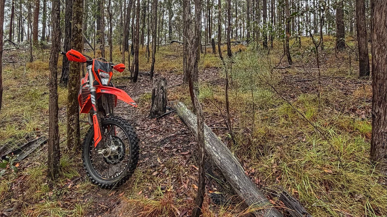 Rainy day singletrack.  KTM 500