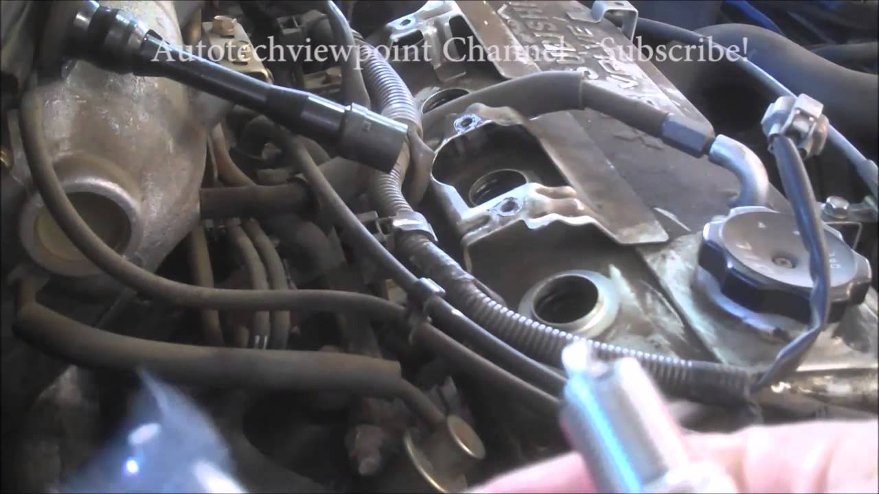 Spark plug replacement Mitsubishi Lancer 2003 2.0  4 cylinder. Install Remove Replace