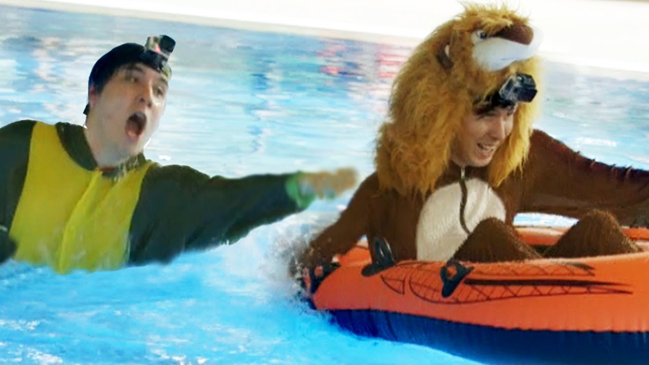 Phil the Lion vs. Dan the Dinosaur! - WATER RACE