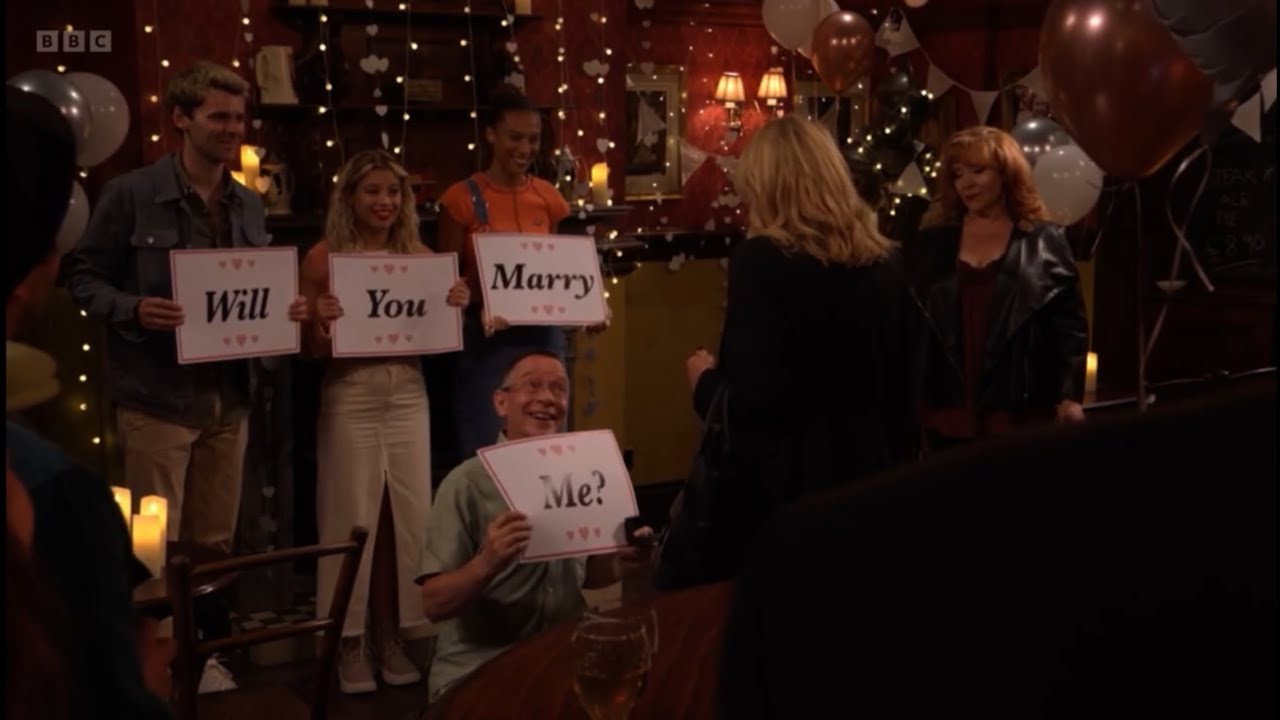 Eastenders Ian proposes to Cindy as she says yes as junior George and David watch scene