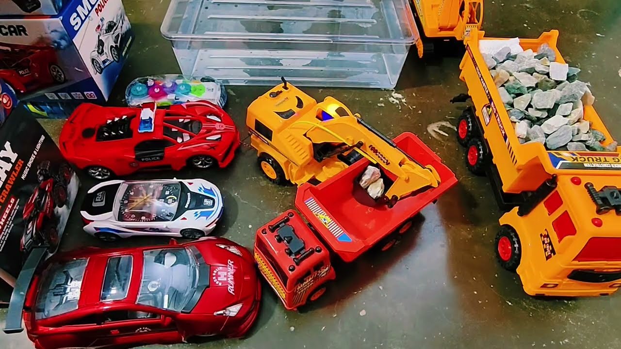 RC super satisfying wheel excavator's hard working। Wheel excavator pulls gear racing car and works
