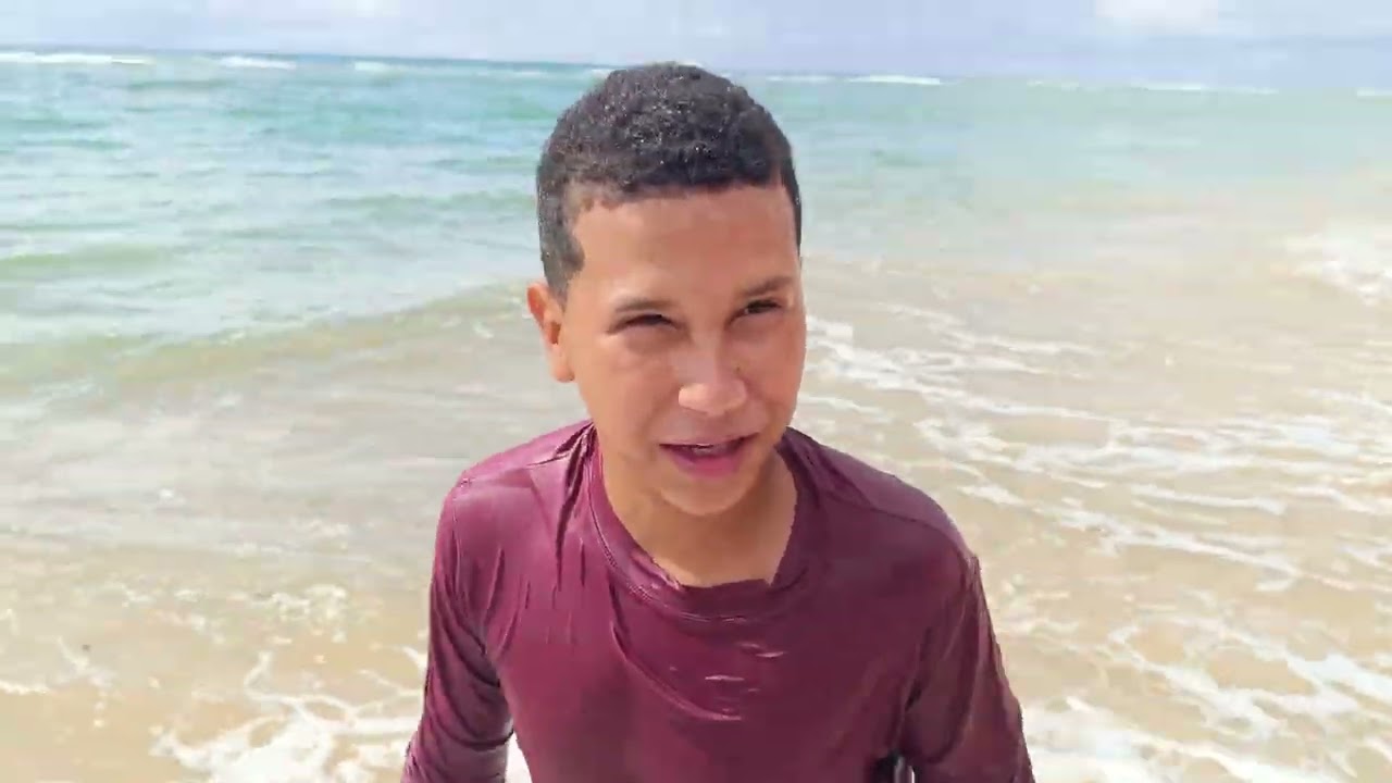 Família na praia top de +