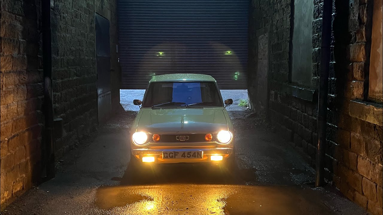 Datsun 100a, driving in the rain