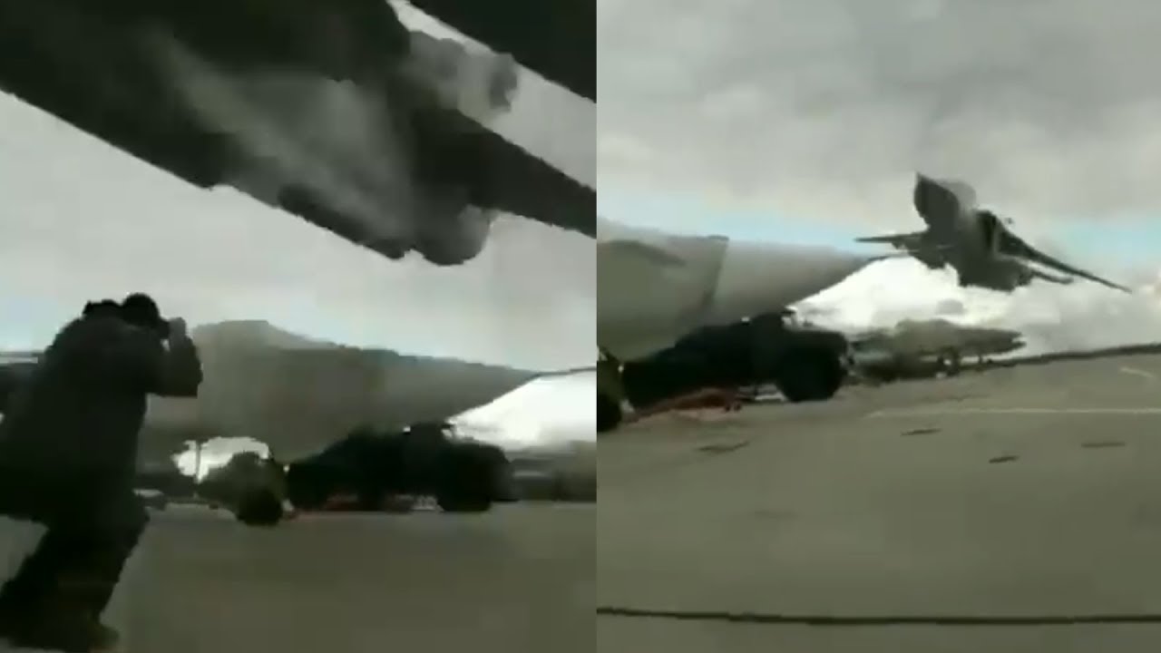 Fighter jet extreme low pass just feet above man's head