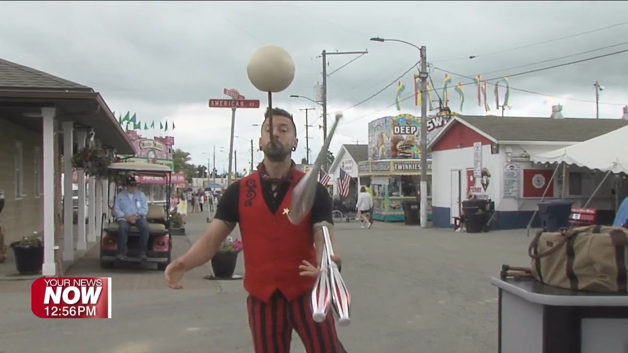 The Circus Man shows off his juggling skills