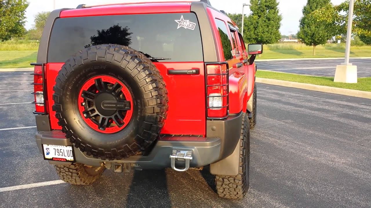 Updated Hummer H3, 35 inch tires, plasti dipped.