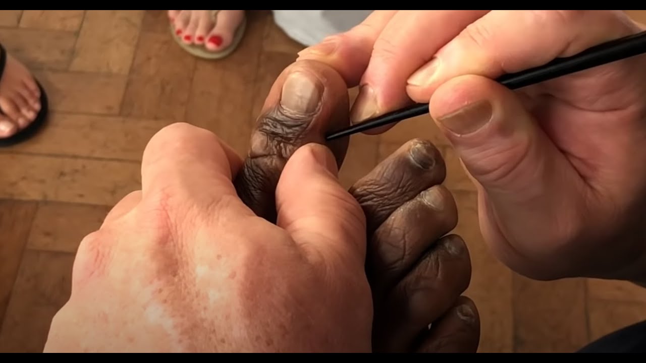 Foot massage and reflexology. Raynor massage on big toe for bunions. Brandon working on Alpha part 2