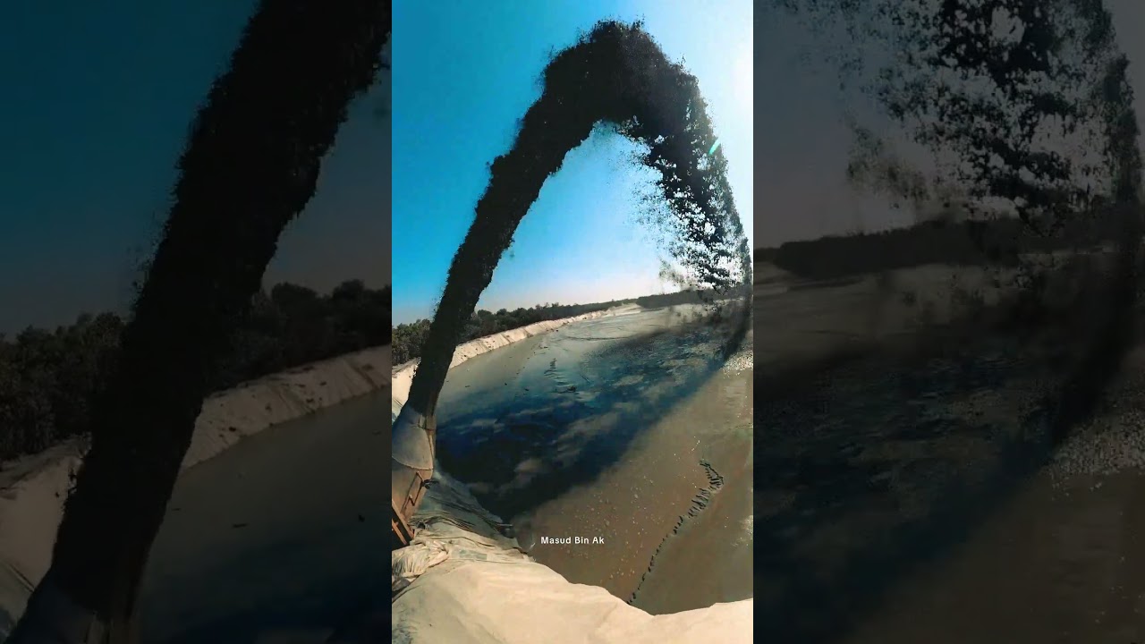 Powerful water flow coming out from a river dredging pipe 🌊