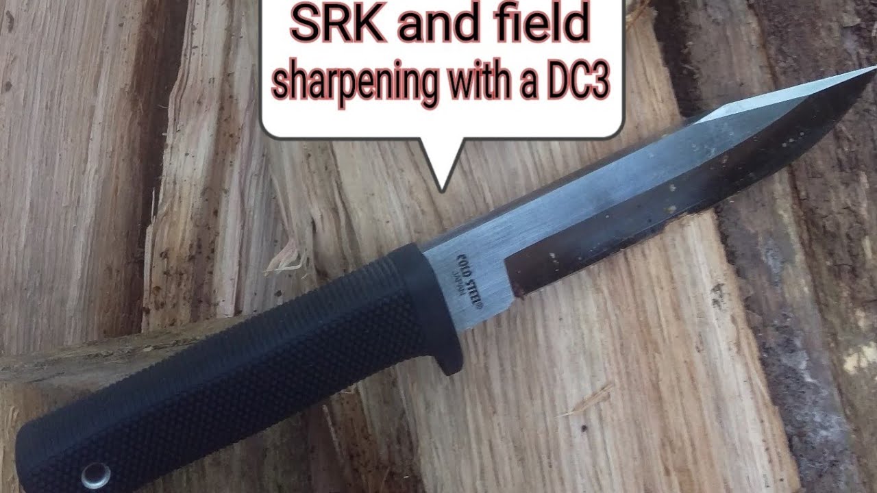 Cold steel SRK in use , field sharpening with a Fallkniven DC3 stone