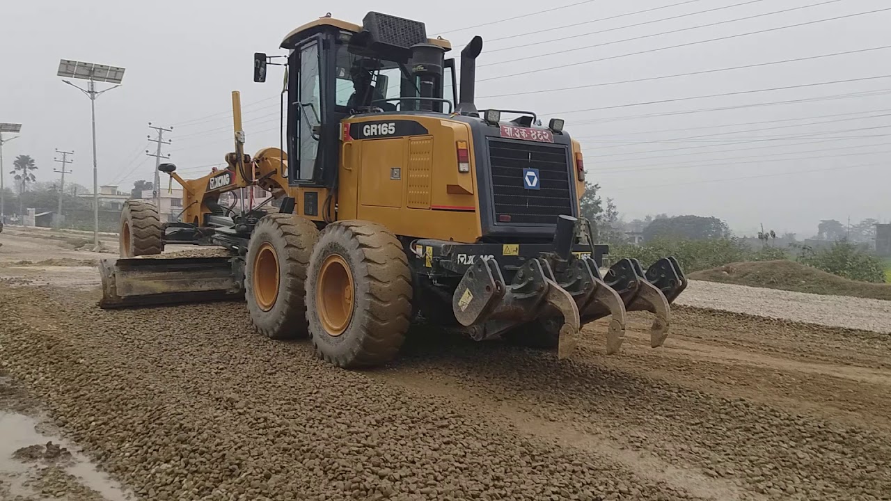 Road construction: Base course laying