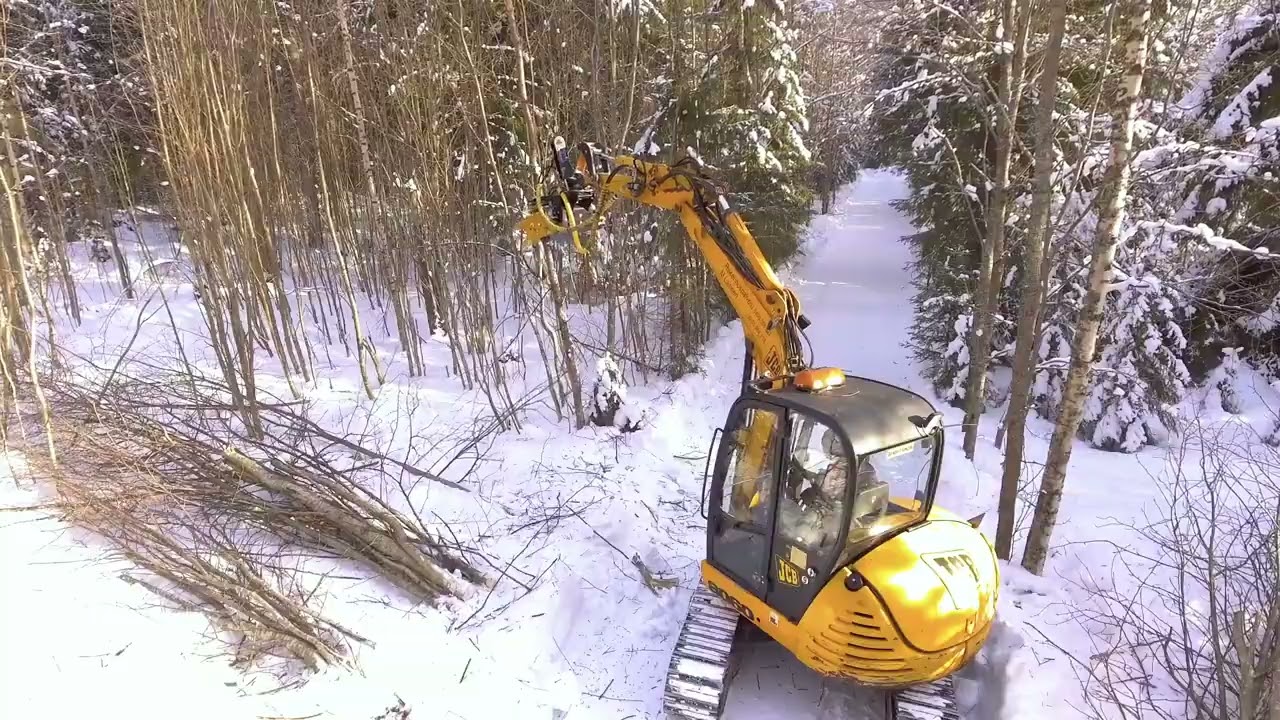 Głowica ścinkowa do biomasy TMK200 do mini koparki JCB 8060. Wyposażona w collector (kolekcjoner)