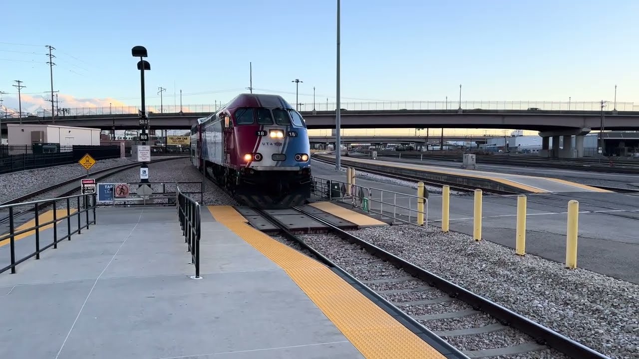 UTA FrontRunner MP36PH-3C 18 and Cab Car 118 pull into Salt Lake Central Station
