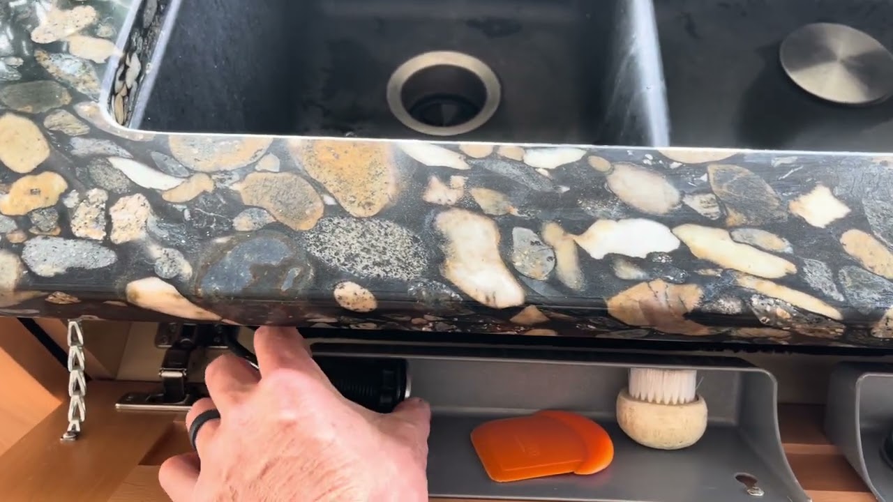 Garbage disposal with hidden pressure switch