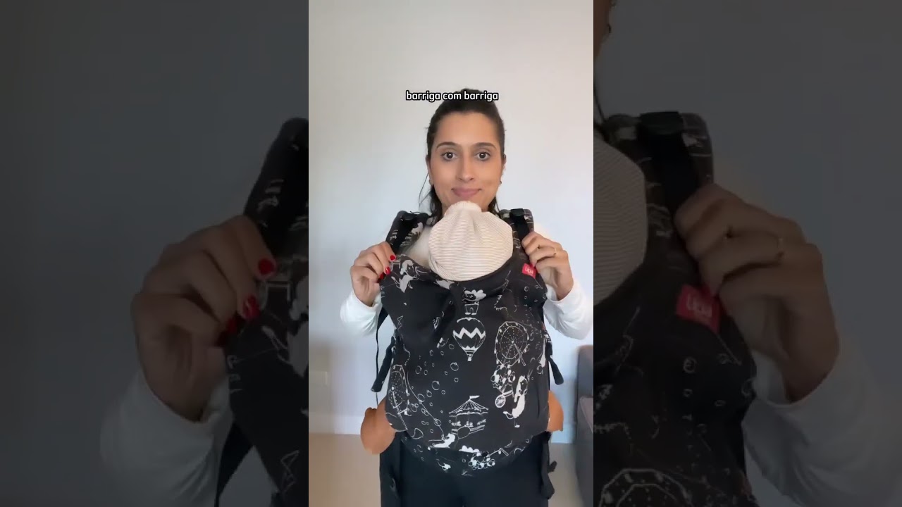 Usando a mochila evolutiva (canguru de beb&ecirc;) da UPA SLING