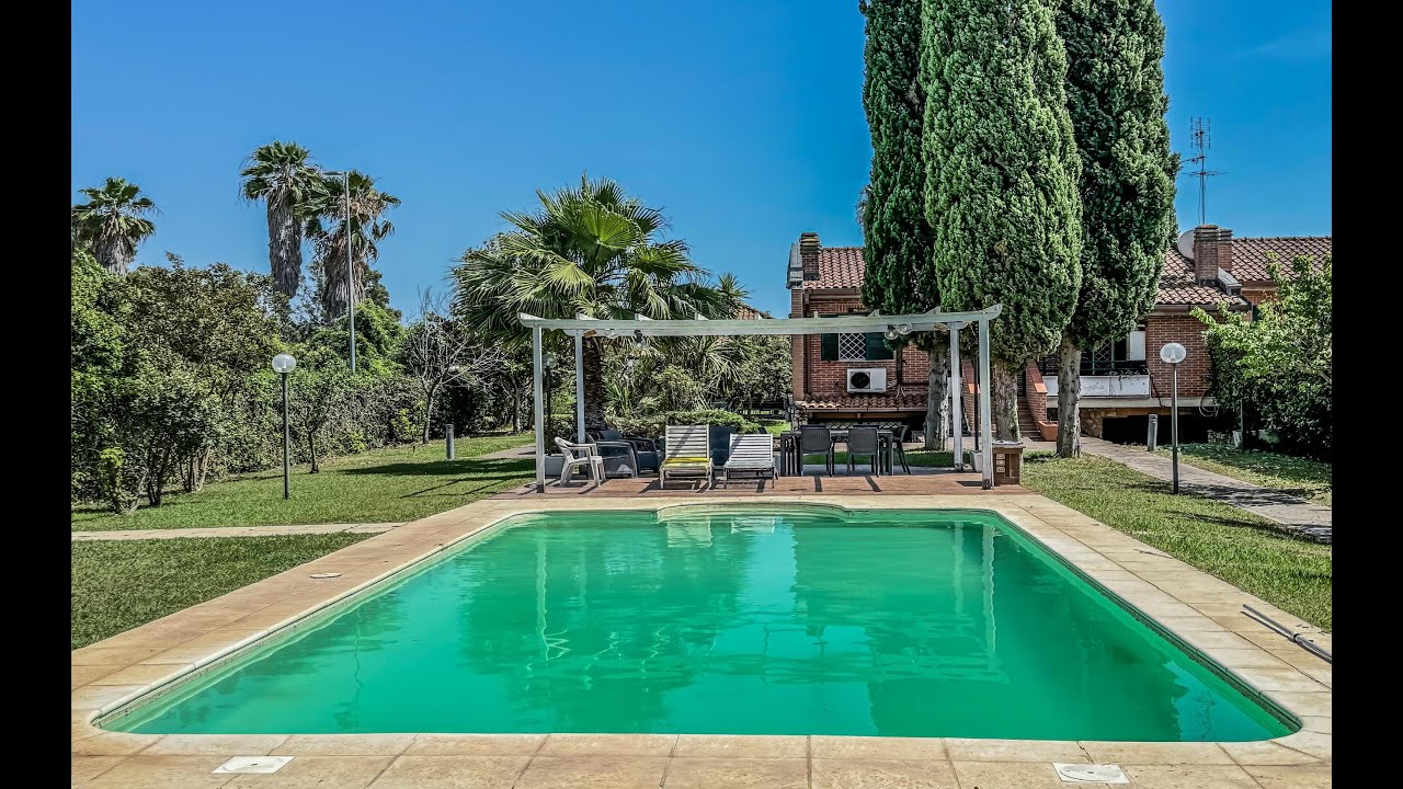Villa in vendita con piscina e grande giardino a Roma  Consorzio Nuova Palocco