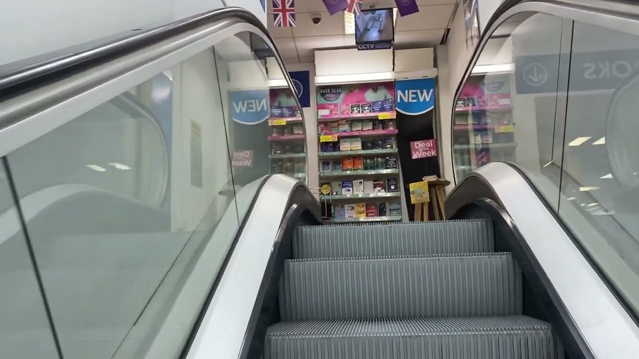 O&K Up Escalator at WHSmith in Oxford
