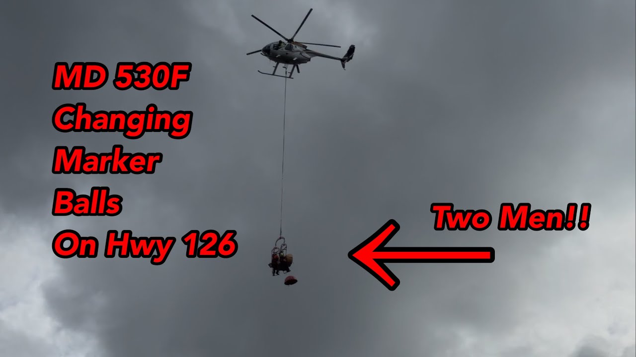 MD530F dangling guys by a rope to replace marker balls