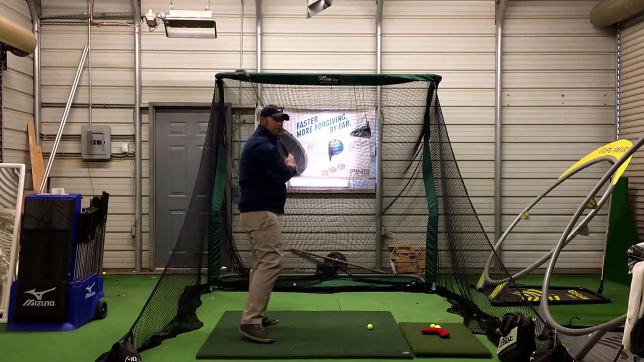 Right heel up to stop locking the right leg in the backswing!