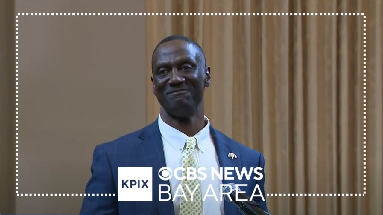 Mayor of Oakland introduces newly appointed Police Chief Floyd Mitchell, who steps forward to speak