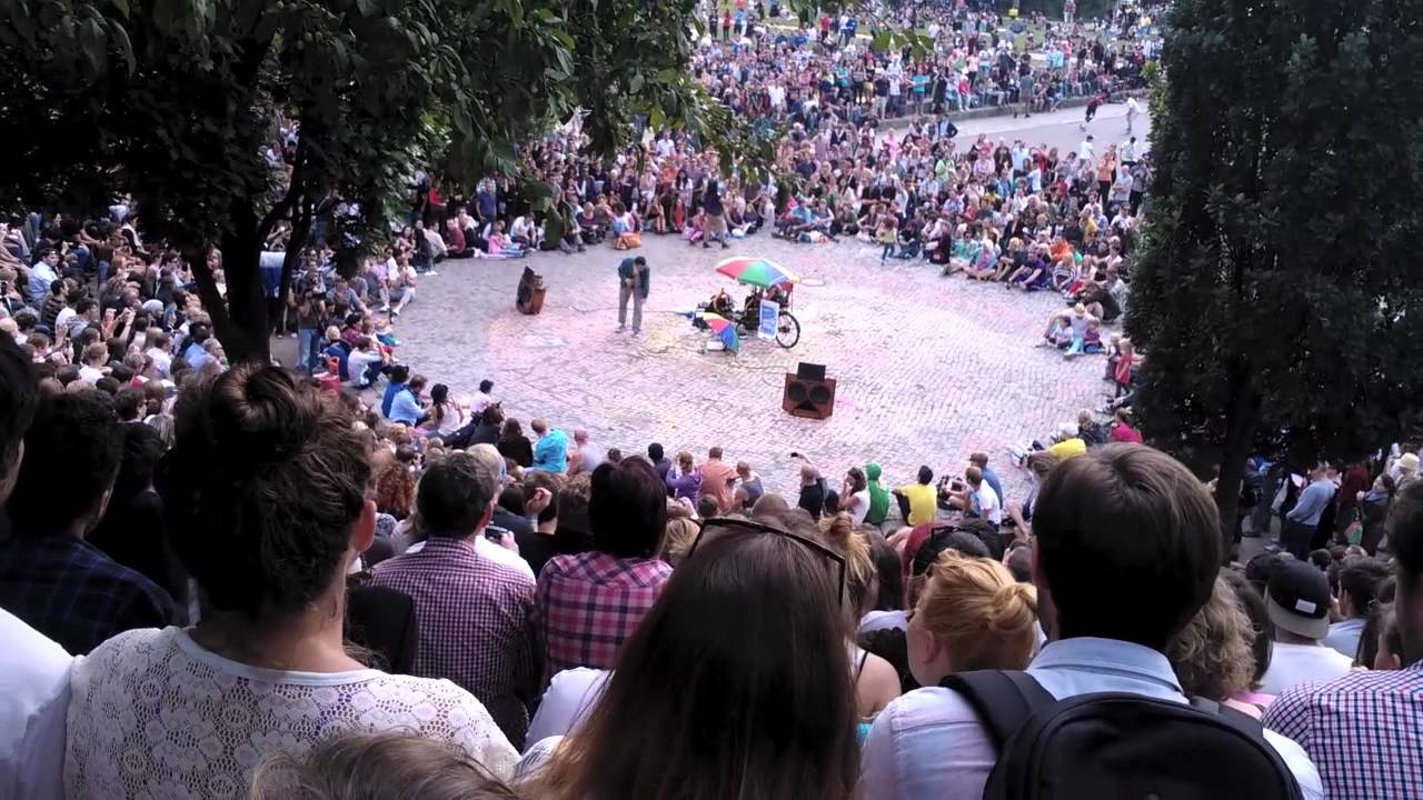 Man from Taiwan sings karaoke in Mauerpark Berlin
