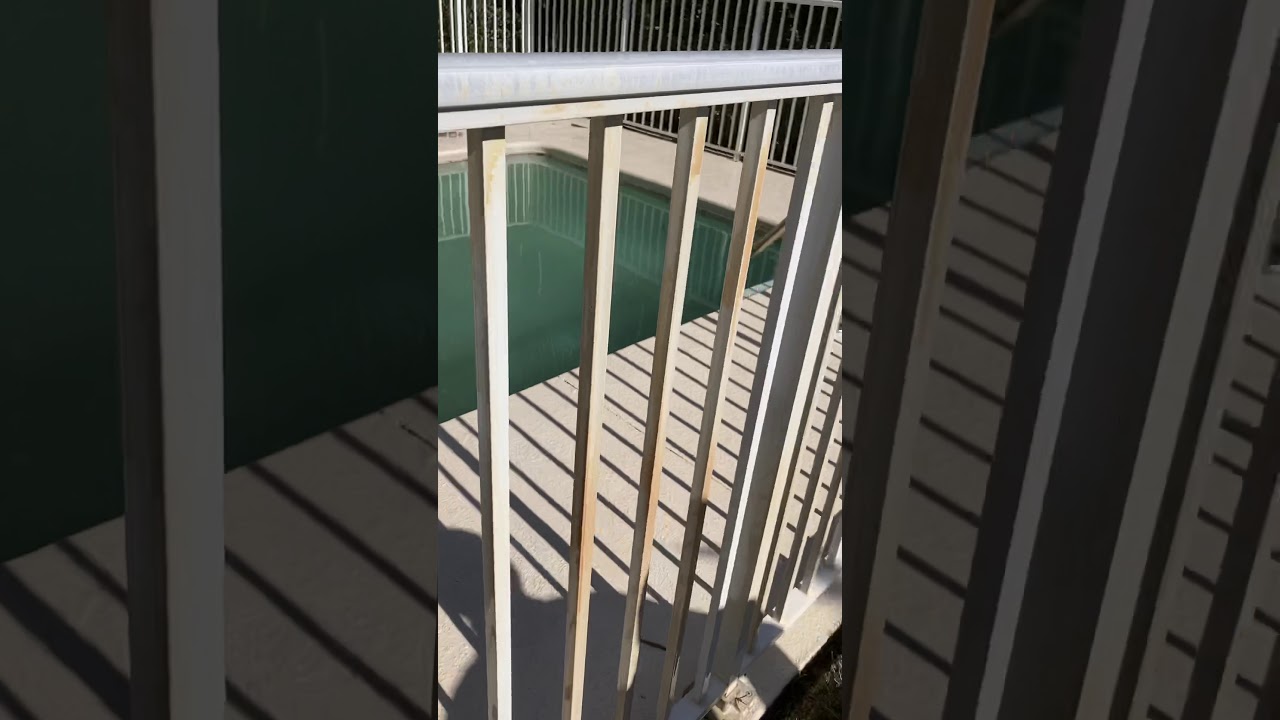 Rust removal from metal fence