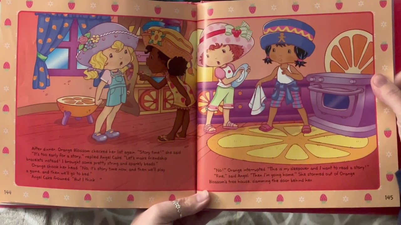 Reading “Strawberry Shortcake Sleeps Over”