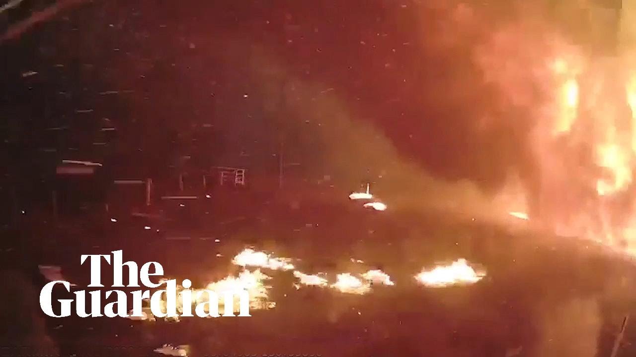 Dashcam footage shows how fast bushfires can move when the wind changes