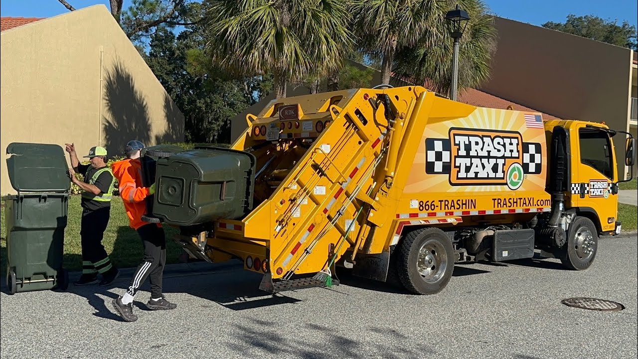 Trash Taxi Isuzu Mini Pac Mac Rear Loader Garbage Truck Packing Post Christmas Trash at a Resort