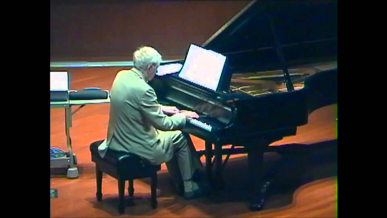 New Zealand composer, Brent Parker plays his music at Grinnell College.
