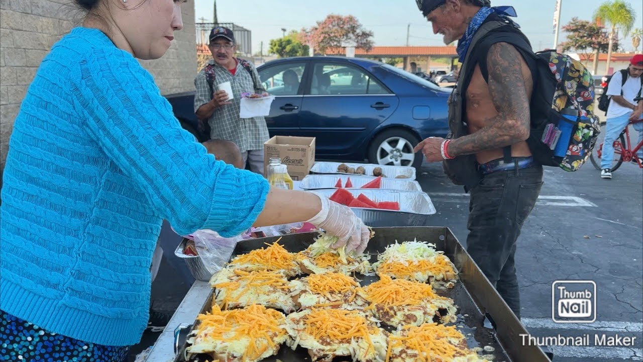 Cooking 100 special  egg sandwiches for the homeless .