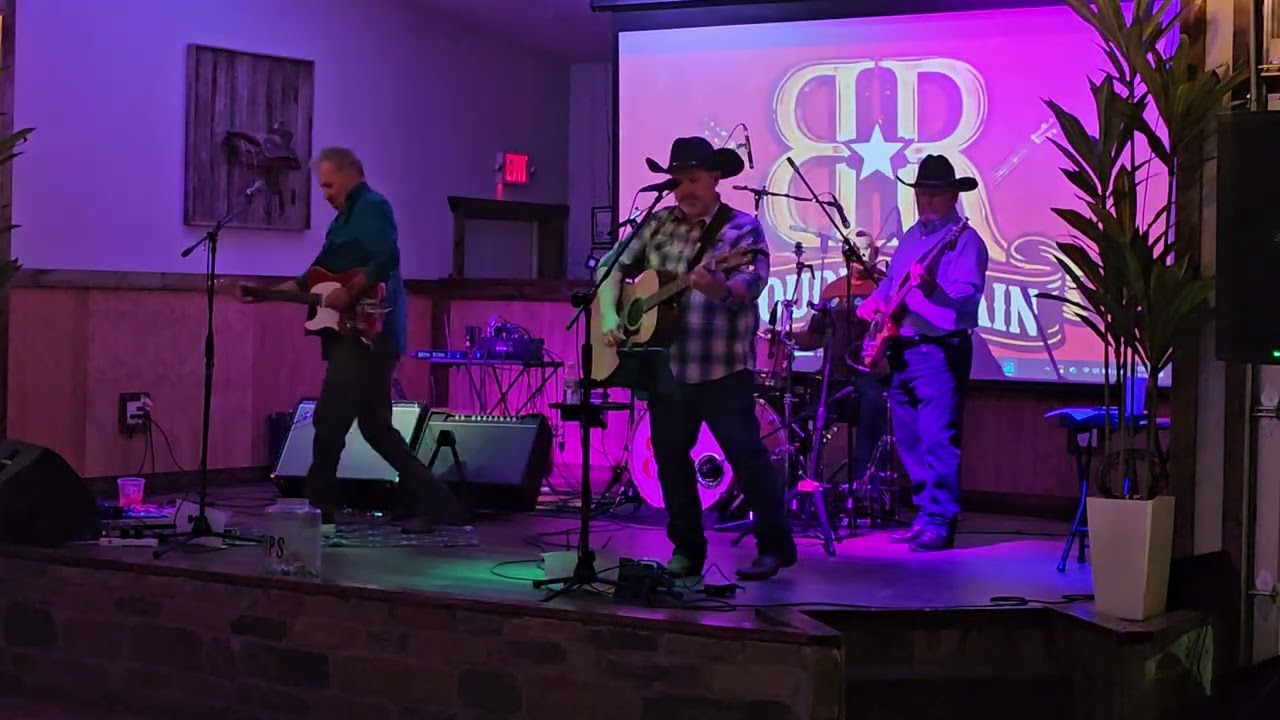 Bourbon Rain playing a cover of Your Man by Josh Turner