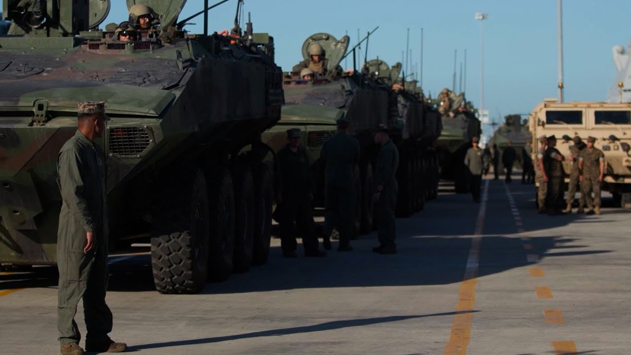 U.S. Marines load 18 Amphibious Combat Vehicles aboard the amphibious assault dock landing ship