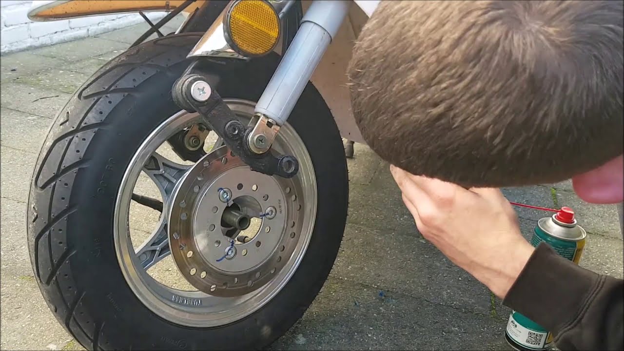 retroscooter remblok  loopt aan